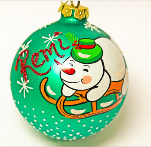 snowman on green 100mm personalised christmas bauble on sleigh